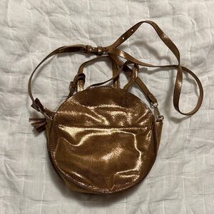 Shimmering Gold Round Crossbody Bag